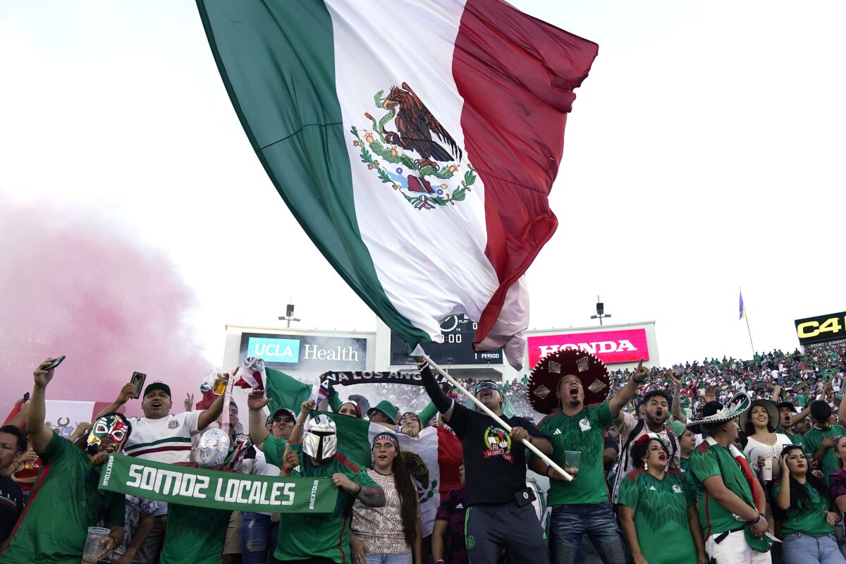 Mexico fans cheer prior to a socc 