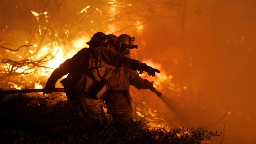 Firefighters battle the 2007 Witch Creek fire.