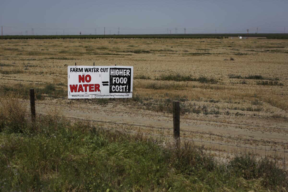 A sign along Interstate 5 in Coalinga, Calif., warns of rising food costs because of the drought.