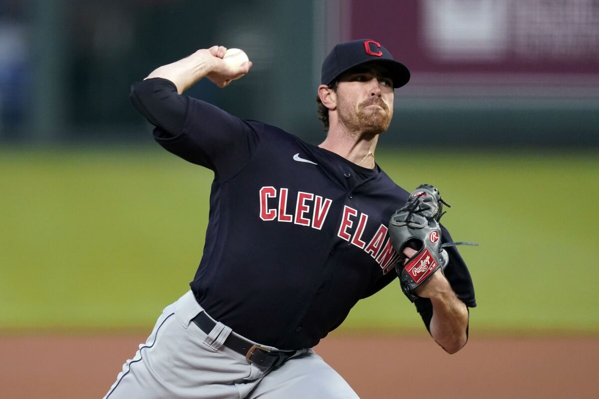 Cleveland Indians starting pitcher Shane Bieber throws during the first inning against the Kansas City Royals.