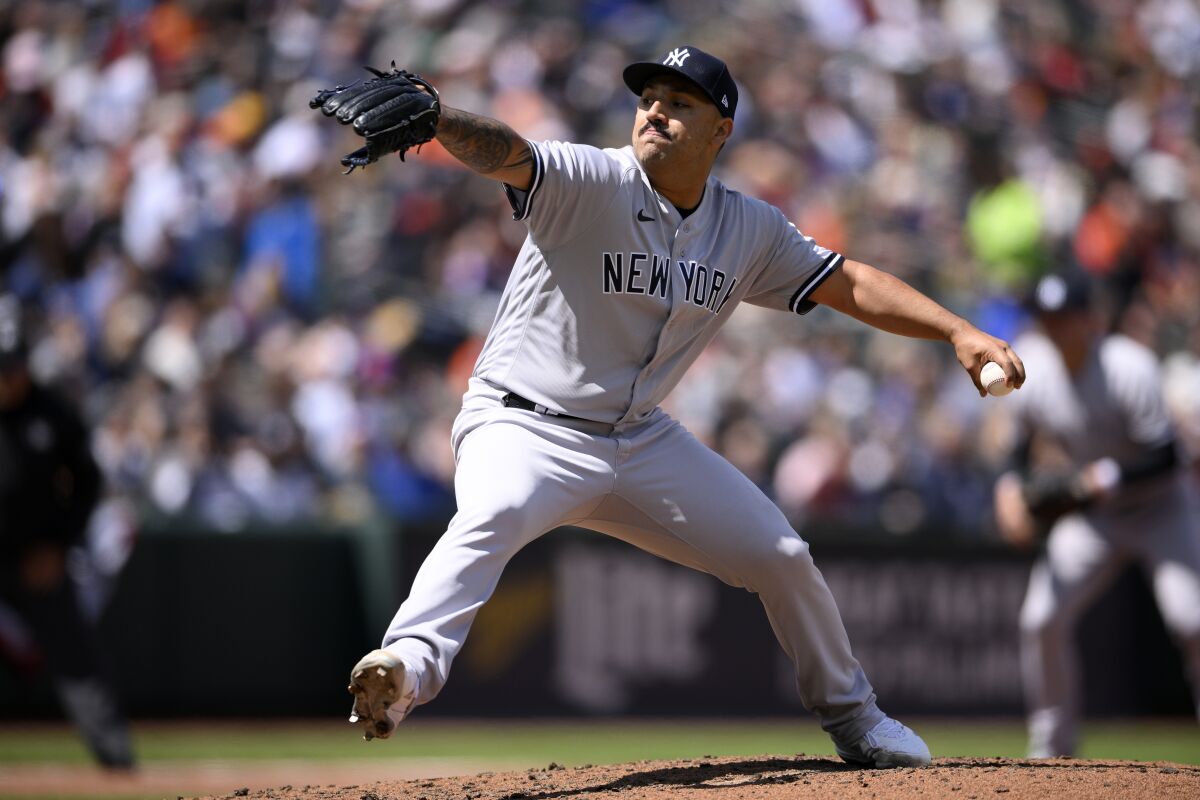 New York Yankees starting pitcher Nestor Cortes delivers during the third inning of a baseball game against the Baltimore Orioles, Sunday, April 17, 2022, in Baltimore. (AP Photo/Nick Wass)