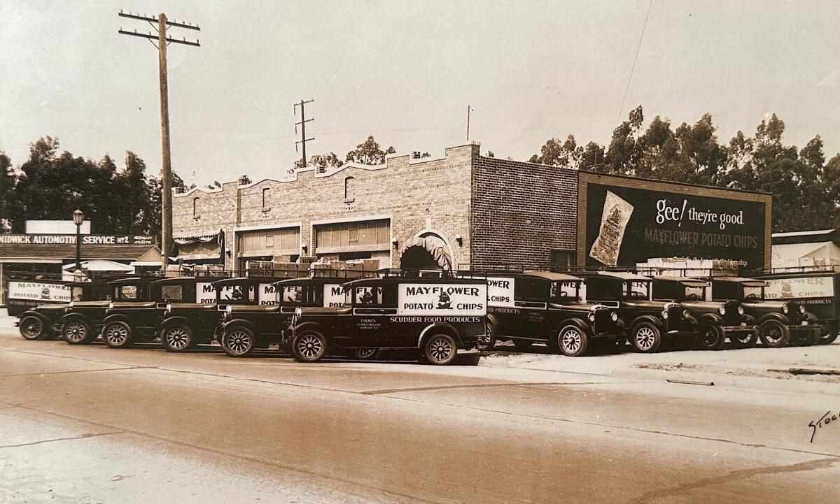 A dozen delivery trucks parked outside the original Laura Scudder food product factory in Monterey Park.