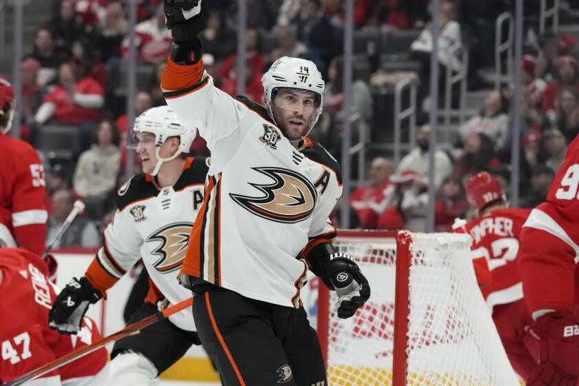 Ducks center Adam Henrique celebrates after scoring in a 4-3 win over the Detroit Red Wings on Monday.