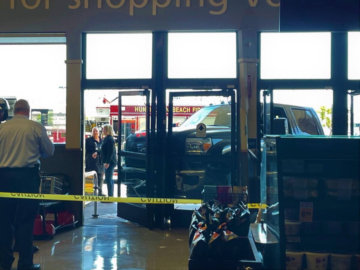 A pickup truck crashed into a Vons grocery store in Huntington Beach.