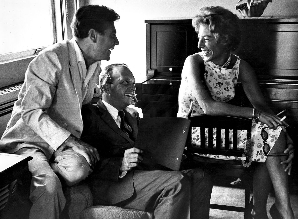 From left, Marshall Barer, Hal Prince and Mary Rodgers working out a tune in 1960.
