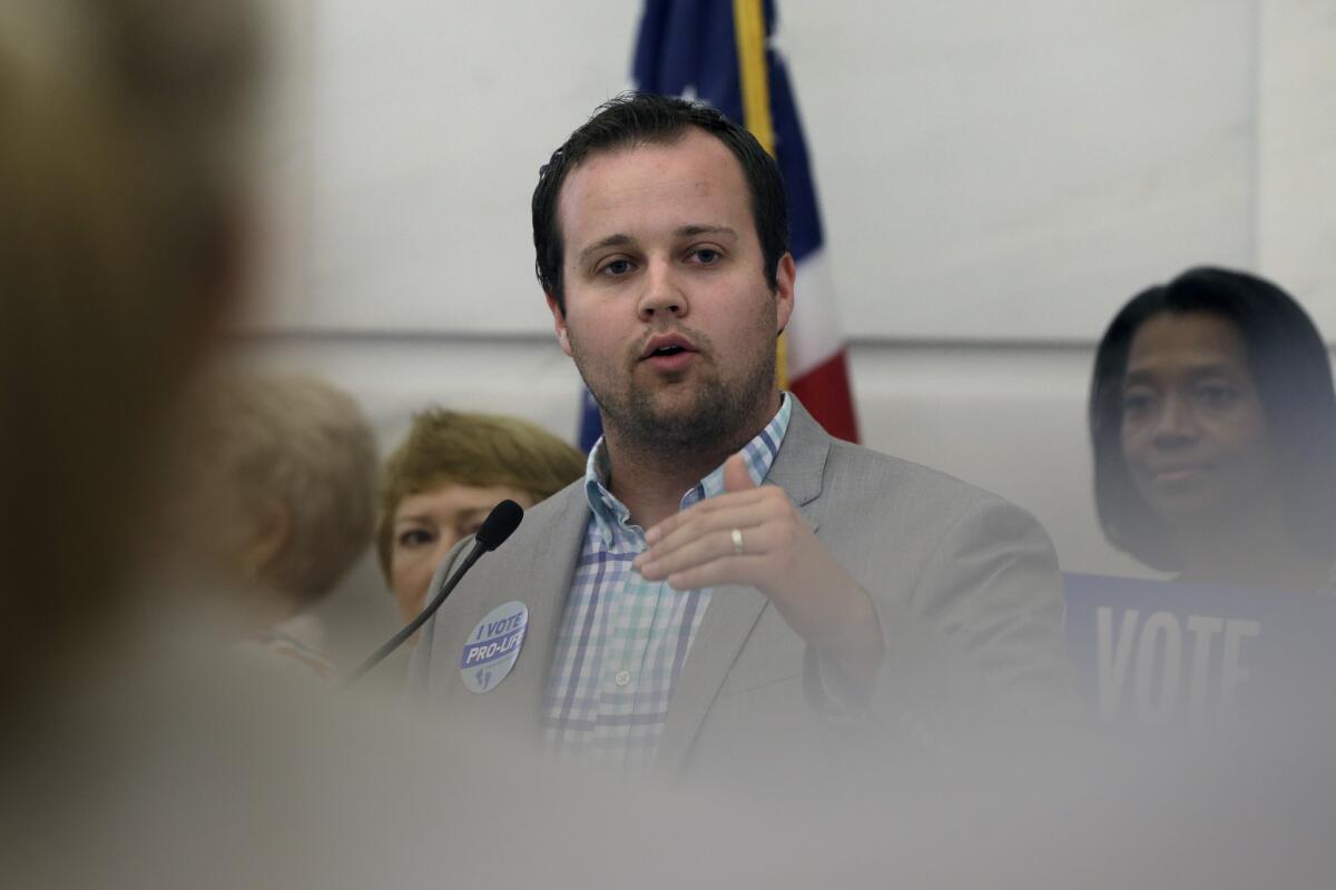 Josh Duggar, seen in August 2014, said on Facebook that he regretted things he had done as a teenager.