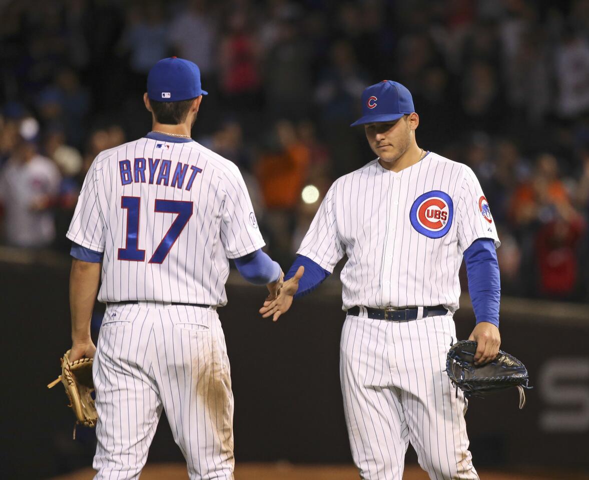 Kris Bryant and Anthony Rizzo at the conclusion of their team's 5-4 win.