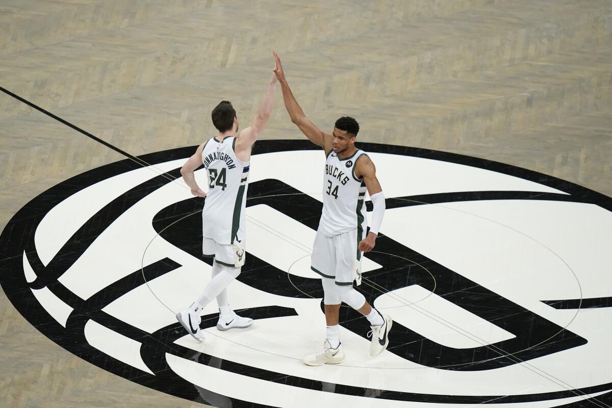 NBA Playoffs 2021: Milwaukee Bucks edge Brooklyn Nets, Kevin Durant's  historic game not enough