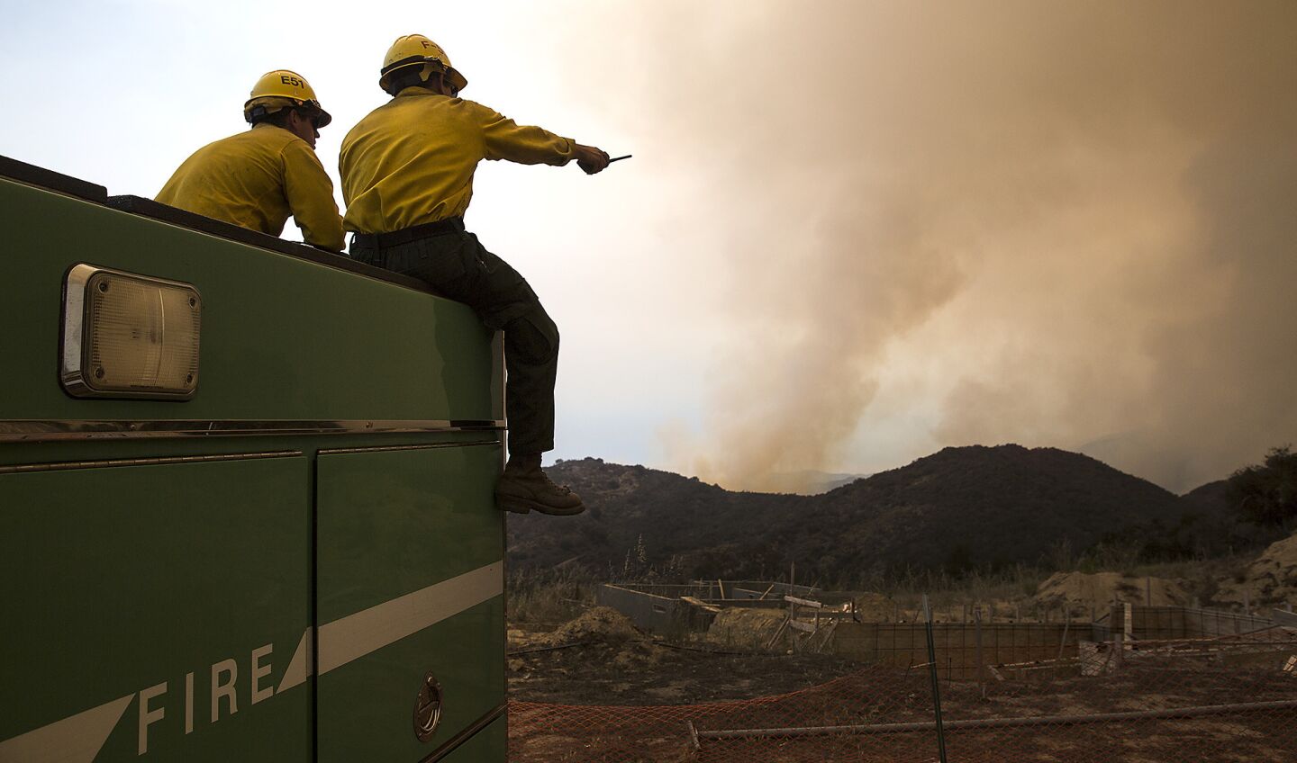 US Forest Service firefighters keep an eye on the Sherpa fire burning above El Capitan Ranch in Santa Barbara CountyFriday.