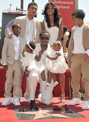 Sean Diddy Combs poses with his family after being honored with a star on Hollywood Walk of Fame.
