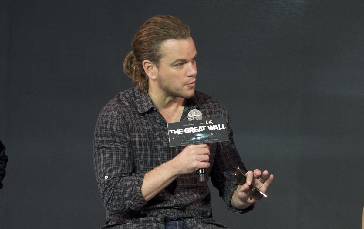 Matt Damon debuts ponytail at "The Great Wall" press conference in Beijing on July 2, 2015.