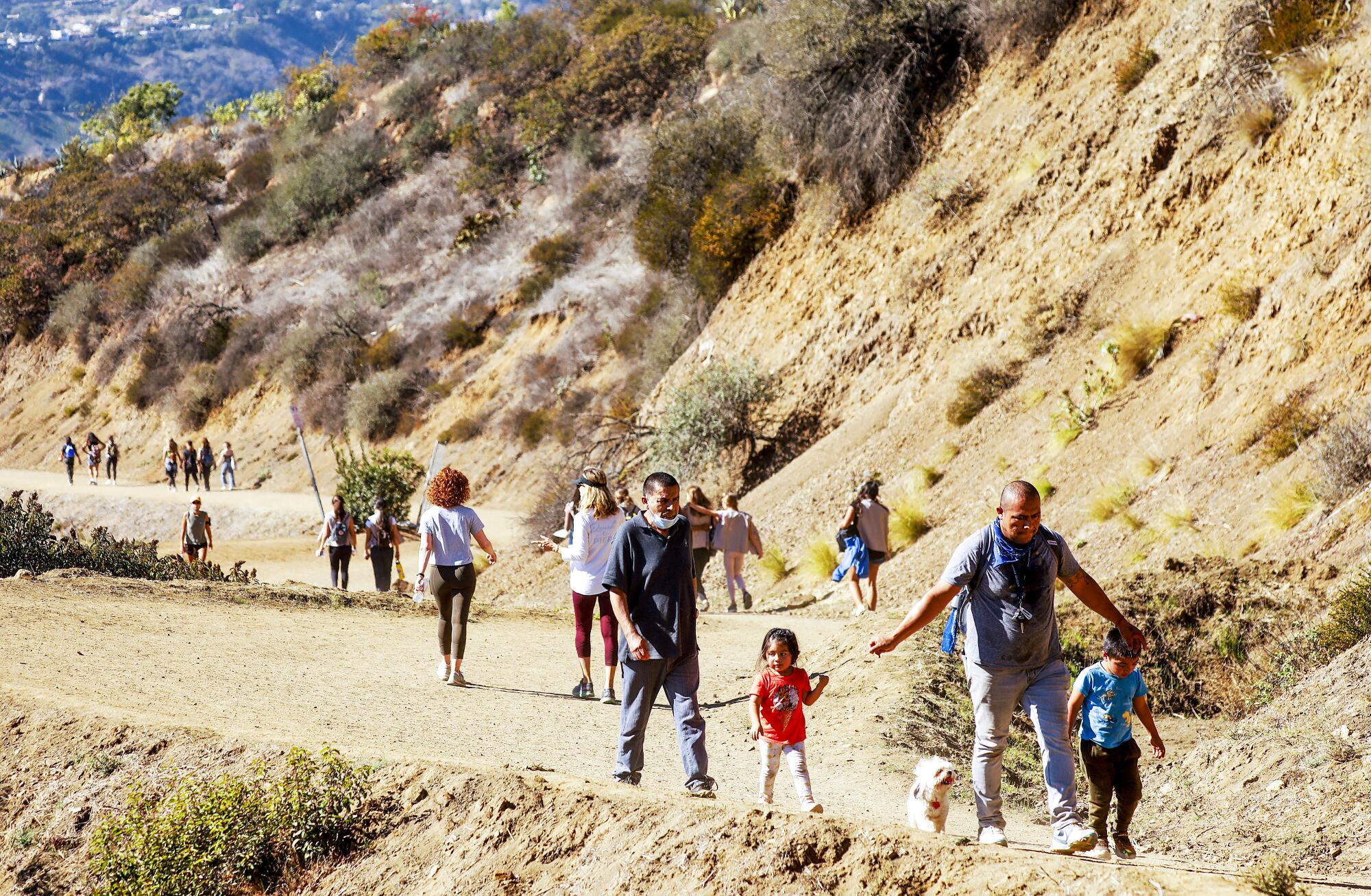 Families hike on the Mt. Hollywood Trail 