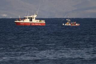 Emergency services at the scene of the search for a missing boat, in Porticello, southern Italy, Tuesday, Aug. 20, 2024. Rescue teams and divers returned to the site of a storm-sunken superyacht Tuesday to search for six people, including British tech magnate Mike Lynch, who are believed to be still trapped in the hull 50 meters (164-feet) underwater. (AP Photo/Salvatore Cavalli)