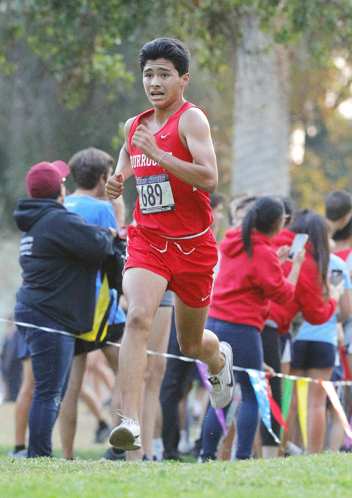 Burroughs' Trevor Villagran in eighteenth place in a Pacific League cross country meet at Arcadia Park in Arcadia on Thursday, November 7, 2019. This is the final league meet of the season.