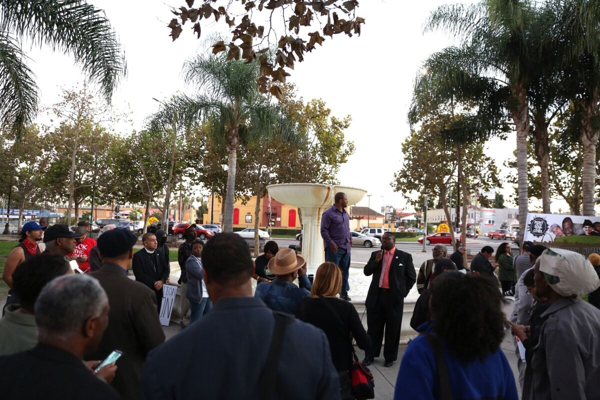 Community members gather at Leimert Park in Los Angeles in anticipation of the grand jury decision in the Michael Brown shooting in Ferguson.