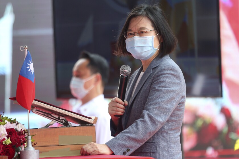 Taiwan's President Tsai Ing-wen delivers a speech during a launch ceremony for its first indigenous amphibious transport dock in Kaohsiung, southern Taiwan, Tuesday, April 13, 2021. (AP Photo/Chiang Ying-ying)