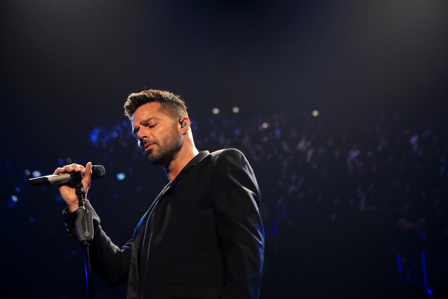 Ricky Martin strikes a pose as he performs at Fiesta Latina at the Forum.