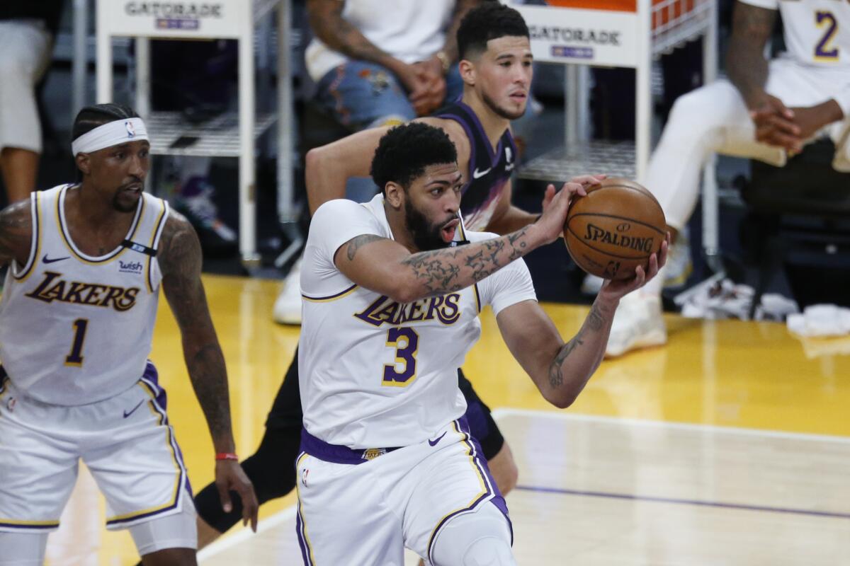 Lakers forward Anthony Davis grabs a rebound during the first quarter of a 123-110 victory.
