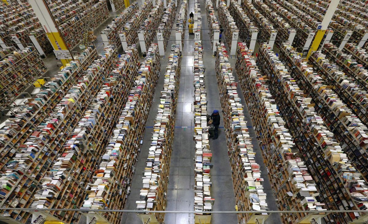 Online retailer Amazon, which has massive fulfillment centers like the one seen here, may open hundreds of retail stores.