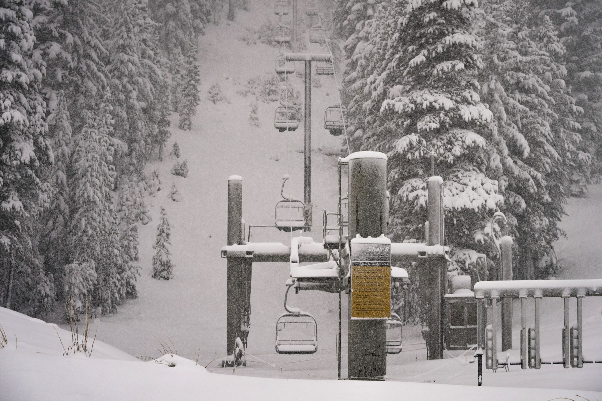 Snow falls on Mammoth Mountain on Monday in Mammoth Lakes, Calif.