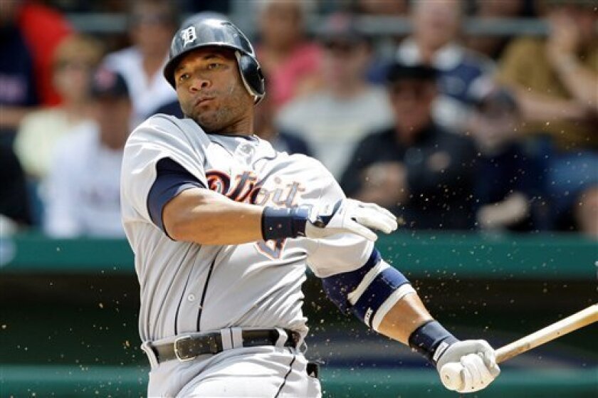 ** THIS ADDS THAT SHEFFIELD IS ONE HOME RUN AWAY FROM 500 FOR HIS CAREER This is a March 23, 2009, file photo showing Detroit Tigers' Gary Sheffield swinging during his strike out in the third inning of their spring training baseball game against the Boston Red Sox in Fort Myers, Fla. The Tigers released the nine-time All-Star on Tuesday March 31, 2009, leaving him without a team as he closes in on becoming the 25th player to reach 500 career homeruns. (AP Photo/Charles Krupa, File)