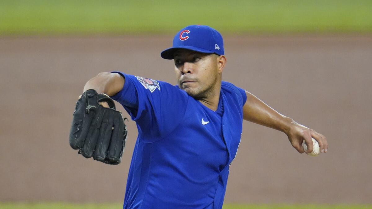 Left-hander Jose Quintana winds up for a pitch.