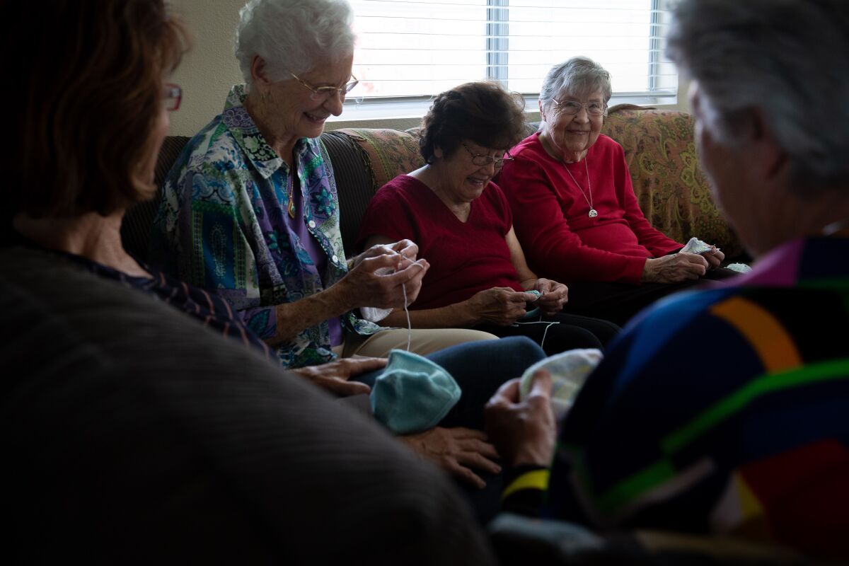 Pat Anderson, 89, far right, leads the Sisterhood of the Boobless Wonders, a group of seven senior lady knitters 