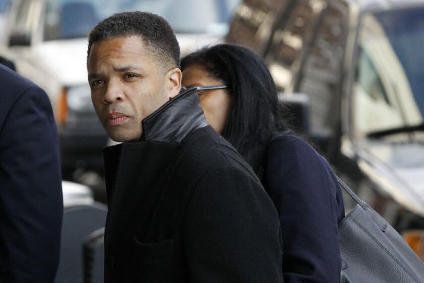 Jesse Jackson Jr. arrives at District Court in Washington to face federal charges.