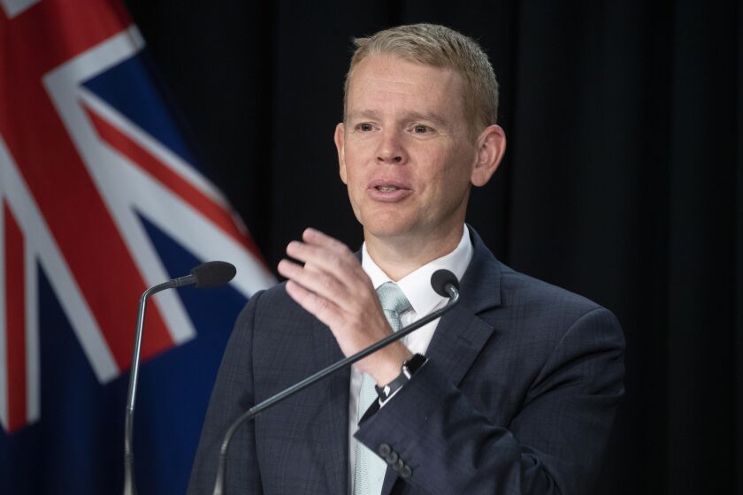 FILE - New Zealand Prime Minister Chris Hipkins speaks to the media after he was sworn into office at Government House in Wellington, Wednesday, Jan. 25, 2023. Hipkins said Tuesday, Jan. 31, 2023, he's selected a team of lawmakers to lead the country that will focus on the everyday concerns of New Zealanders such as the rising cost of living. (Mark Mitchell/New Zealand Herald via AP, File)