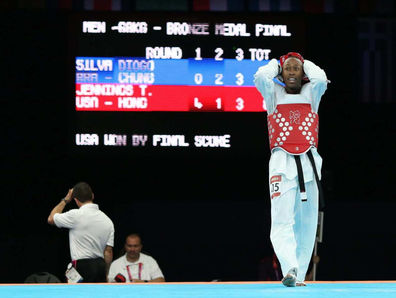Terrance Jennings of the United States looks on in disbelief at the end of his match against Diogo Silva of Brazil in the men's taekwondo 68kg bronze medal match. Jennings won, 8-5.