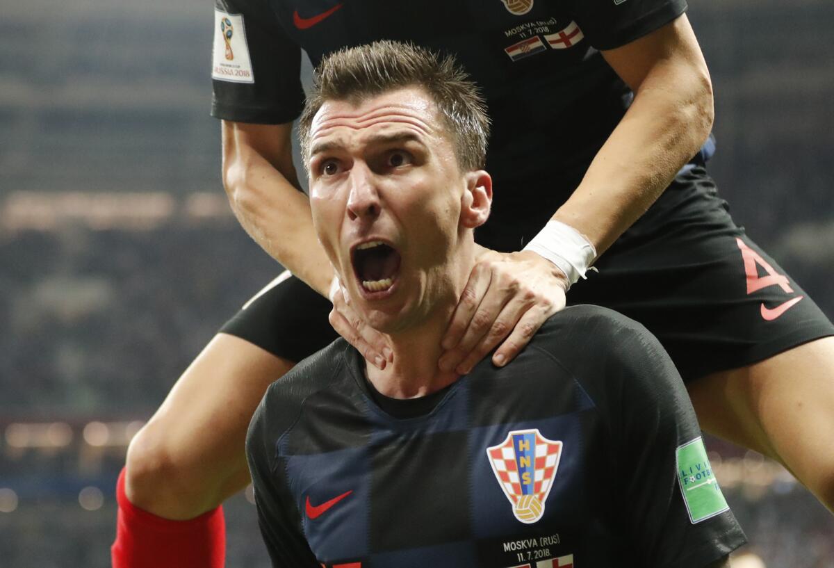 Croatia's Mario Mandzukic celebrates after scoring his side's second goal during the semifinal match between Croatia and England at the 2018 soccer World Cup in the Luzhniki Stadium in Moscow, Russia, Wednesday, July 11, 2018.