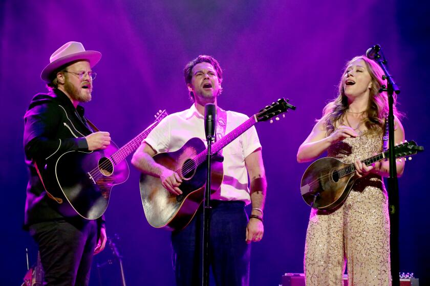 Brian Elmquist, Zach Williams and Kanene Donehey Pipkin of The Lone Bellow 