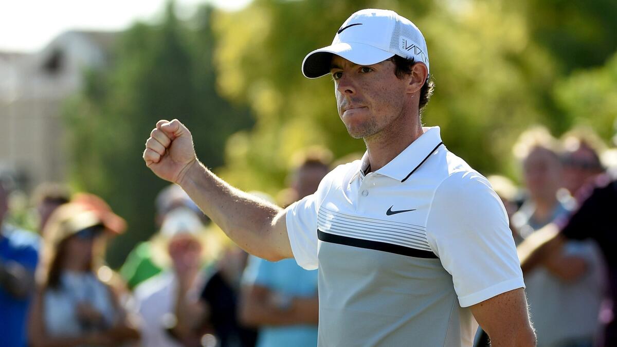 Rory McIlroy reacts after making a birdie putt at No. 12 on Sunday during the final round of the DP World Tour Championship.
