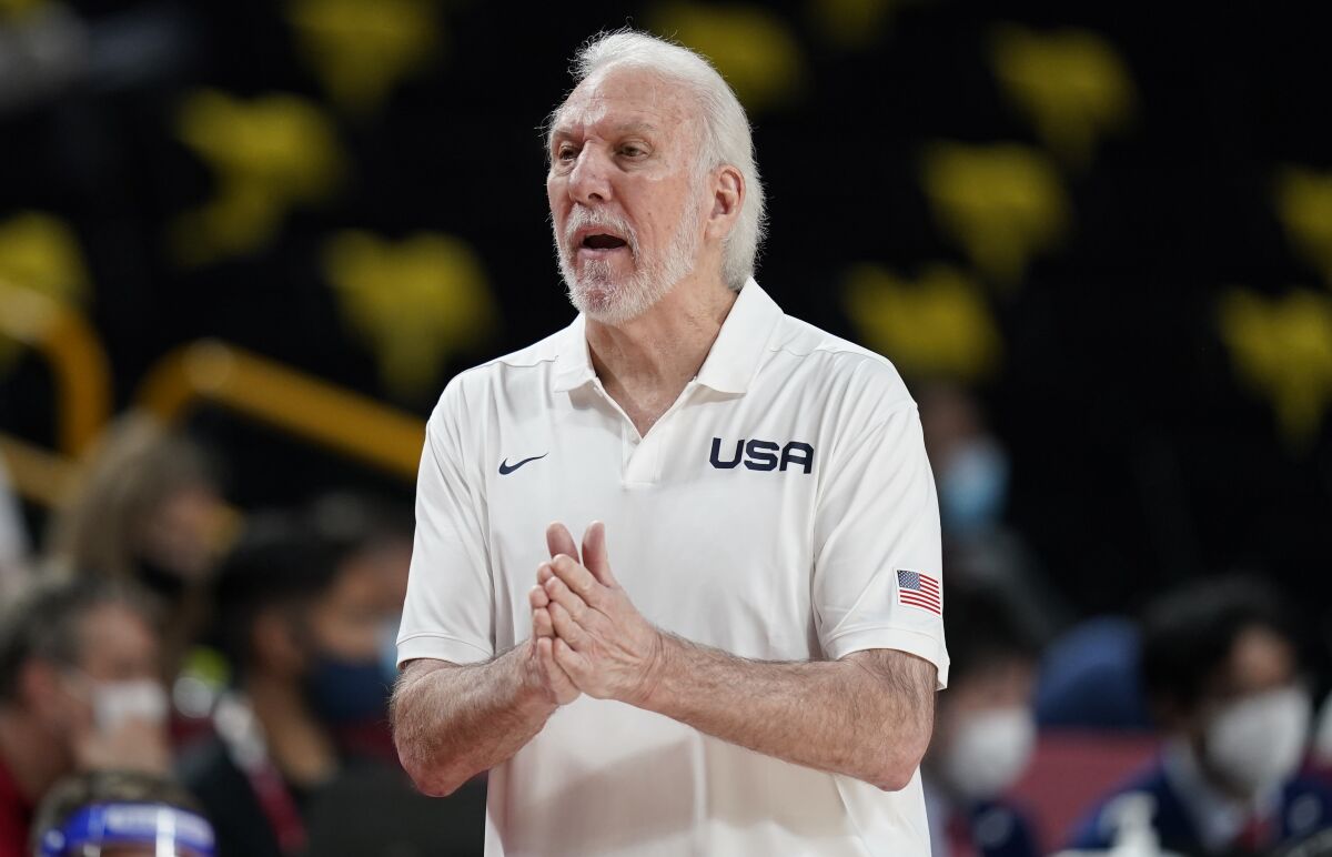 U.S. coach Gregg Popovich questions a call against his team during a game against France 