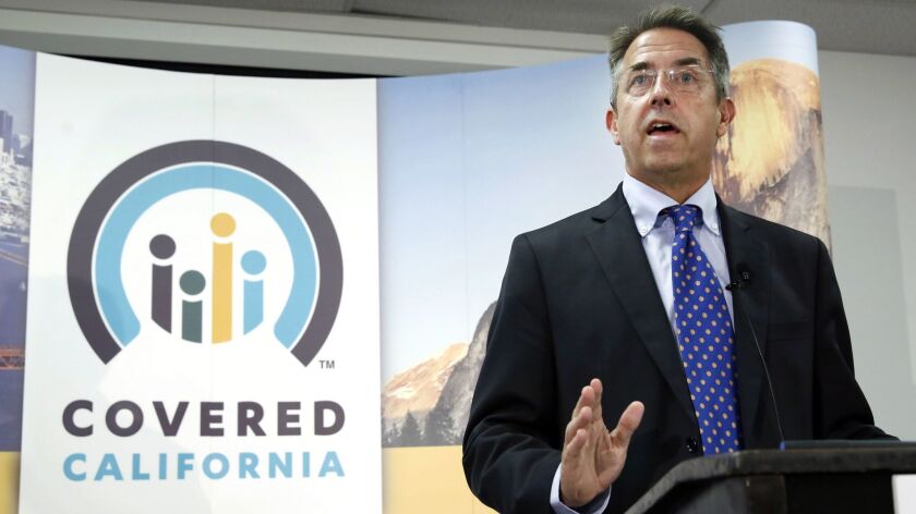 Peter Lee, executive director of Covered California, the state's health insurance exchange, talks at a news conference in 2013 in Sacramento.