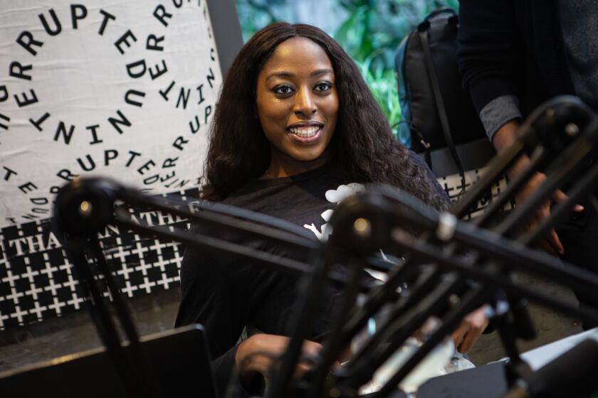 Los Angeles, CA., March 9, 2020 - Chiney Ogwumike, WNBA player, ESPN commentator, and host of Certified Buckets a sports podcast prepares to record her show on Monday, March 9, 2020 in Los Angeles, California. (Jason Armond / Los Angeles Times)