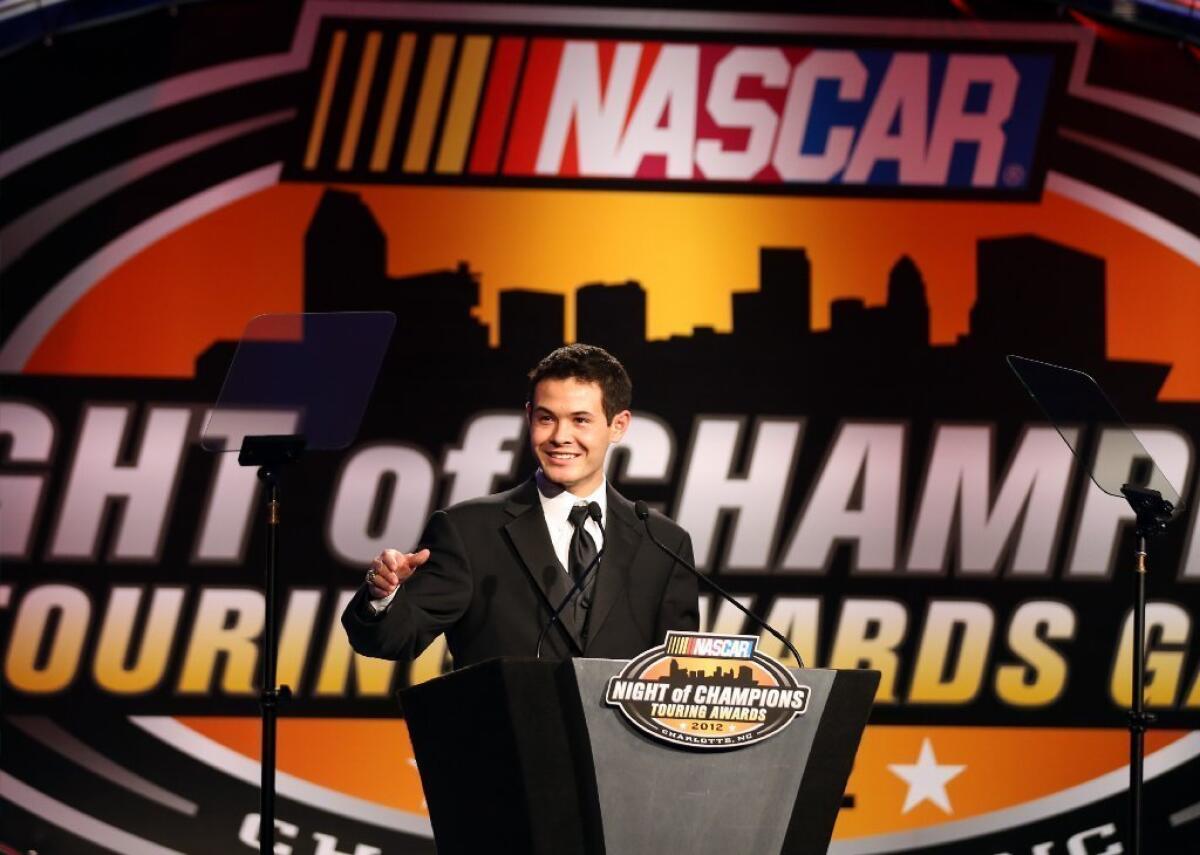 Kyle Larson speaks during the NASCAR Night of Champions Touring Series Awards on Dec. 8.