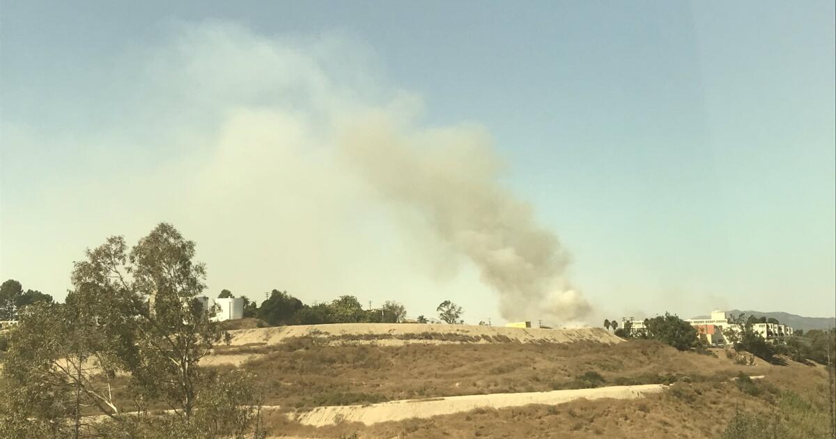 El Sereno brush fire threatens homes as it quickly chews through acreage on Soto Hill