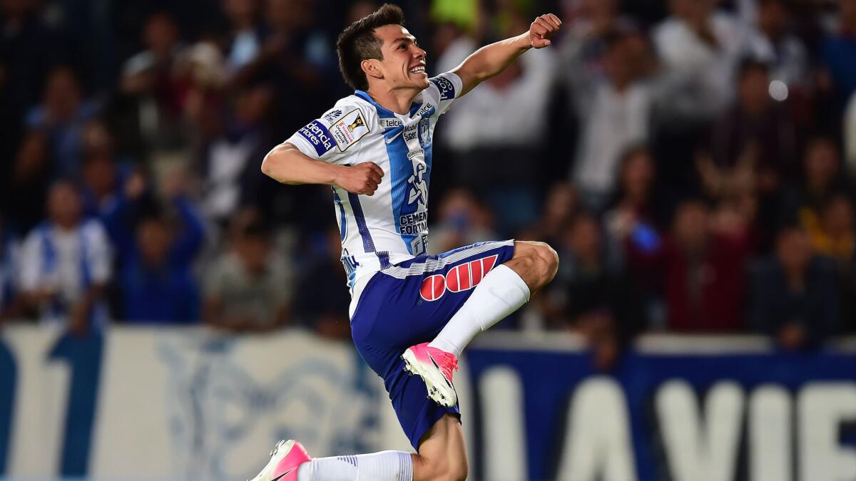 Hirving Lozano, a young star on Mexico's national team, celebrates after scoring a goal for his club team, Pachuca, during a CONCACAF Champions League semifinal against FC Dallas on April 4.