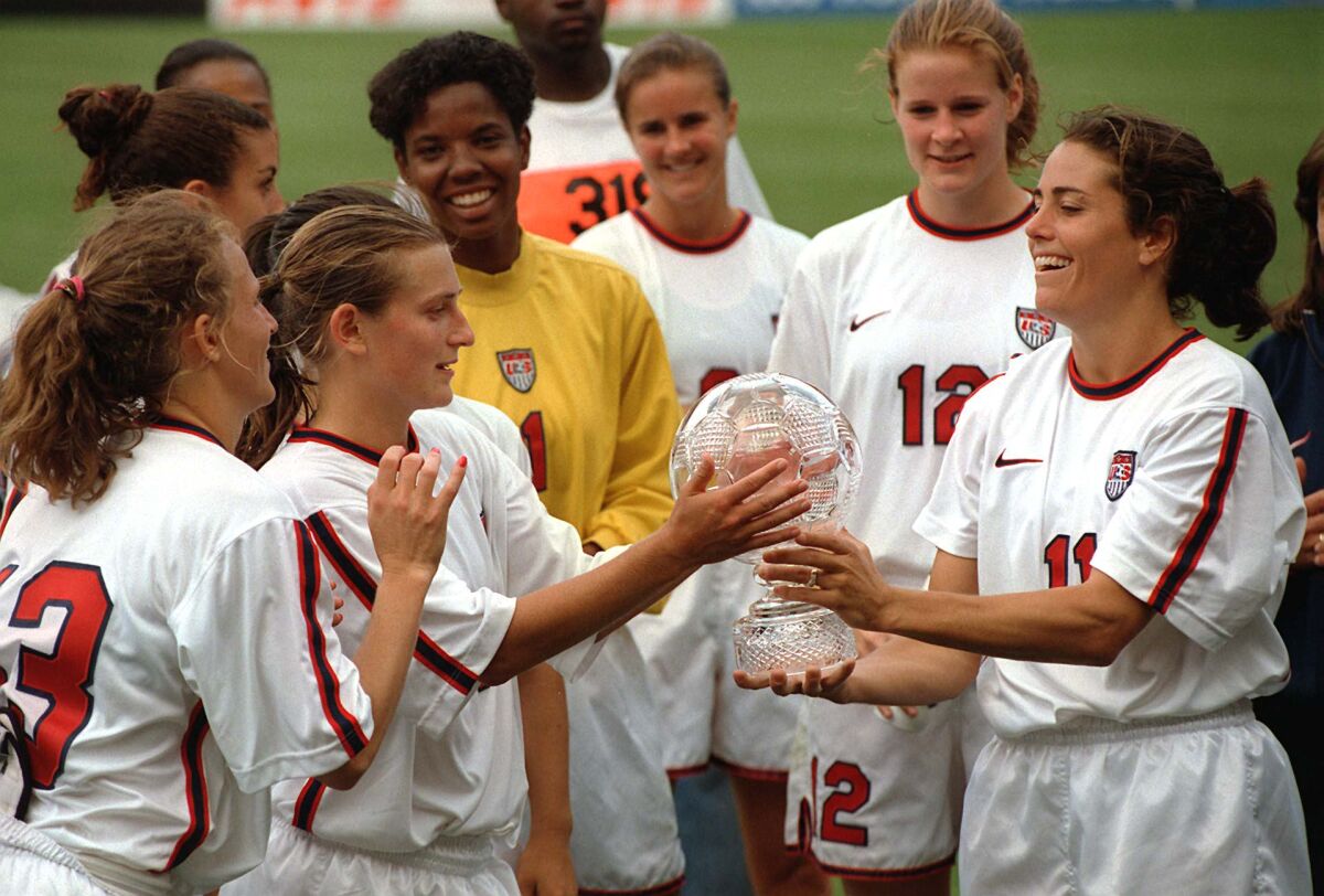 U.S. players Kristine Lilly, Laurie Schowy, Briana Scurry, Cindy Parlow and Julie Foudy celebrate.