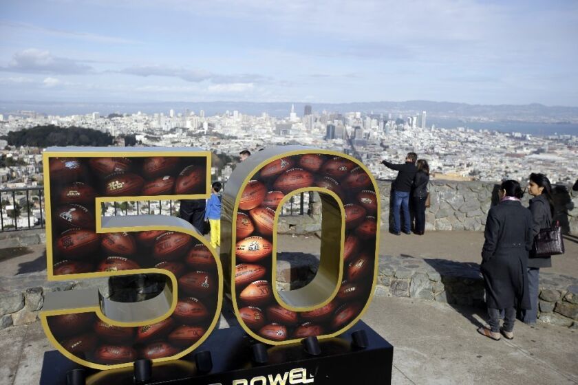 A Super Bowl 50 sign decorates a lookout point above San Francisco on Jan. 30.