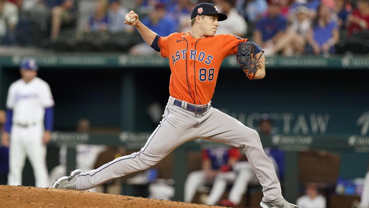 HOUSTON, TX - AUGUST 11: Houston Astros relief pitcher Phil Maton (88)  throws a pitch in the top of the ninth inning during the MLB game between  the Los Angeles Angels and