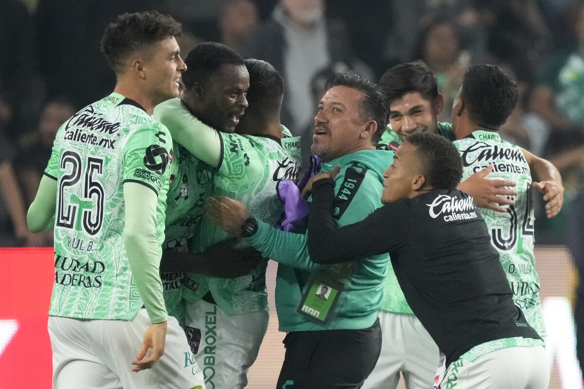 León players celebrate after defeating LAFC to win the CONCACAF Champions League final at BMO Stadium on Sunday night.
