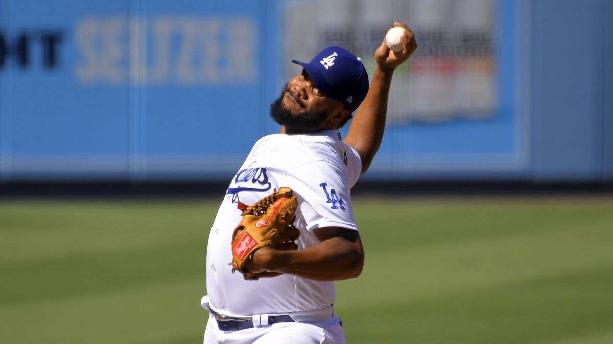 Los Angeles Dodgers relief pitcher Kenley Jansen throws to the plate during the ninth inning.