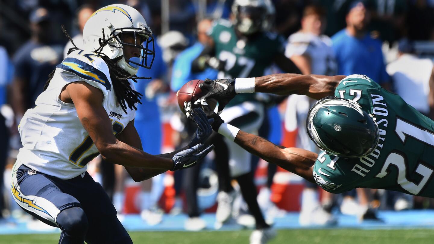 Eagles cornerback Patrick Robinson dives to break up a pass intended for Chargers receiver Travis Benjamin in the first quarter at StubHub Center.
