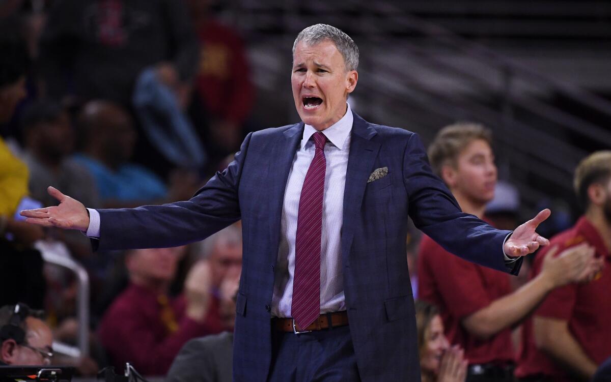 USC coach Andy Enfield argues with a referee during a win over Washington on Feb. 13.