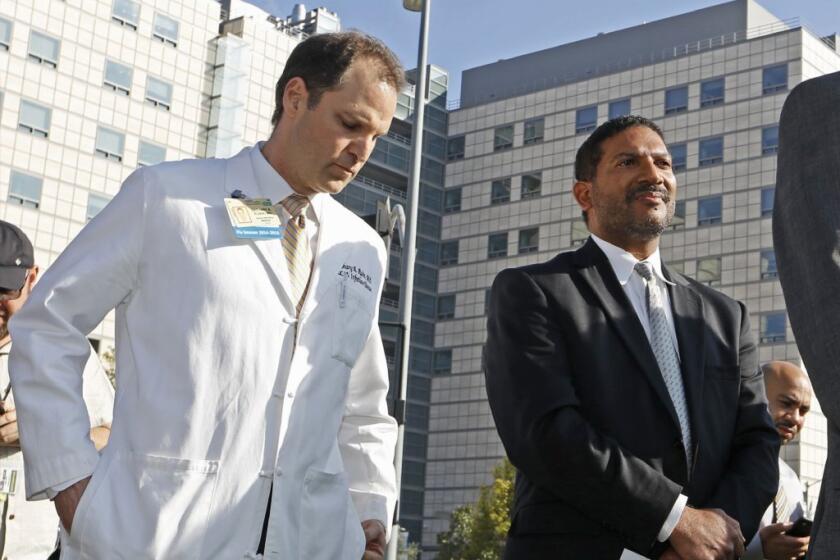 Dr. Zachary Rubin, medical director of clinical epidemiology at UCLA's Ronald Reagan Medical Center, left, and Dr. Robert Cherry, chief medical and quality officer for UCLA Health System, take questions last month about a superbug outbreak.