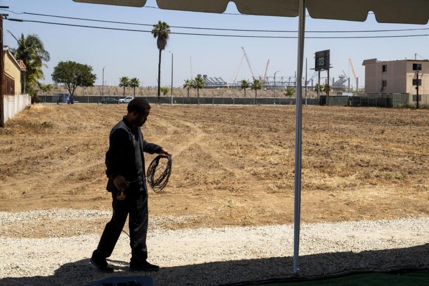 INGLEWOOD, CALIF. -- TUESDAY, JUNE 12, 2018: A view of the vacant land and site of the proposed Clippers Arena Inglewood project in Inglewood. Inglewood City leaders, area community members and labor leaders join LA Clippers chairman Steve Ballmer and Assemblywoman Sydney Kamlager-Dove in announcing widespread support for AB 987. The new state legislation will help ensure that the new Inglewood Basketball and Entertainment Center Project meets strict environmental standards and enhances local services while still protecting vital community interests. Photos taken in Inglewood, Calif., on June 12, 2018. (Allen J. Schaben / Los Angeles Times)
