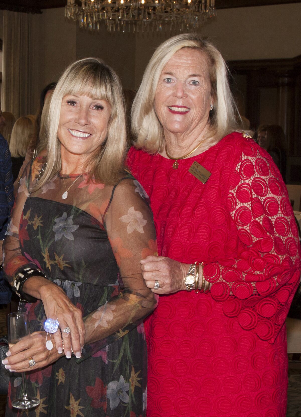 Tammy Cluck, Lisa Grundy Johnson support the Trojan League at "Diamonds Are A Girls Best Friend" event.