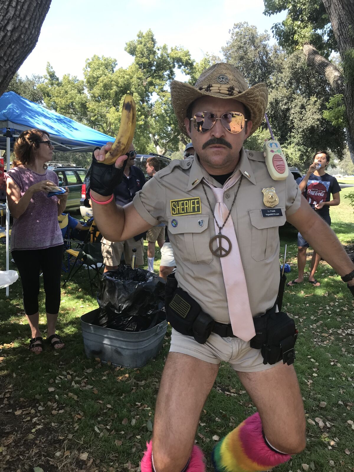 The faux law, a tailgate party crasher dressed for "Reno 911!"